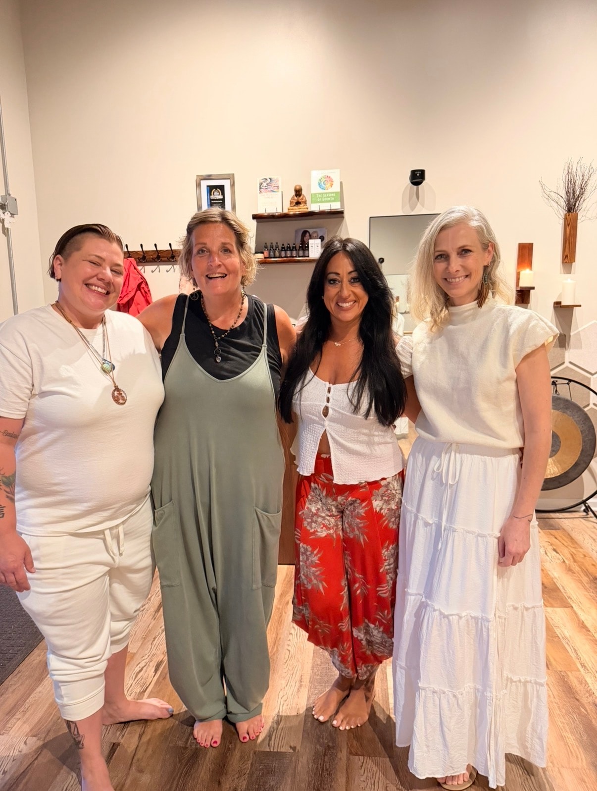 Group photo at Acupuncture & Sound Bath event at Mindful Way Studio Mokena IL — four women smiling in the studio