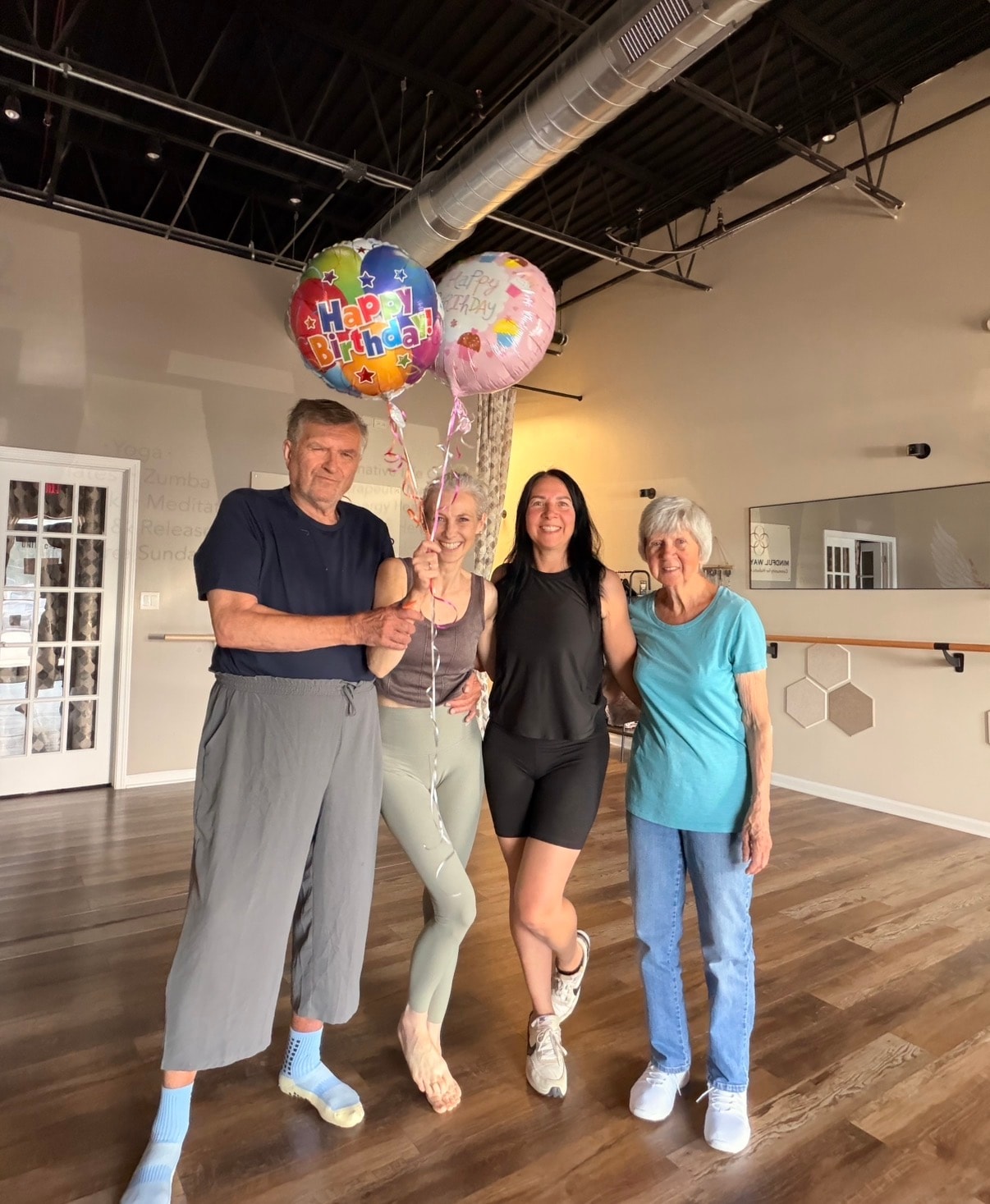 Birthday celebration with balloons inside Mindful Way Studio fitness and wellness space, Mokena IL
