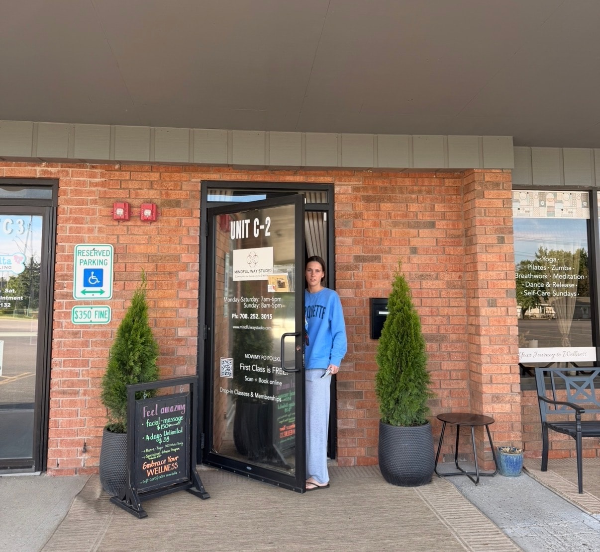 Mindful Way Studio exterior entrance with planters and signage