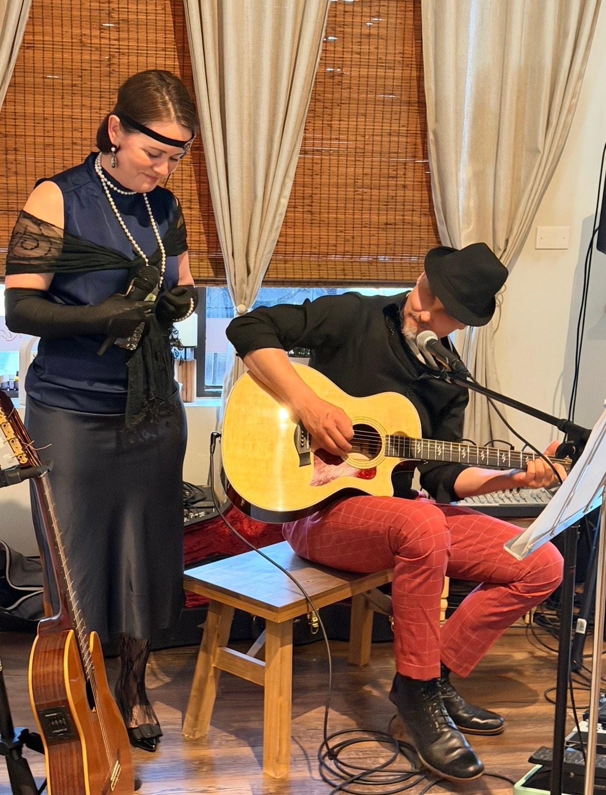 Vocalist performing at the Gatsby-themed private wellness party