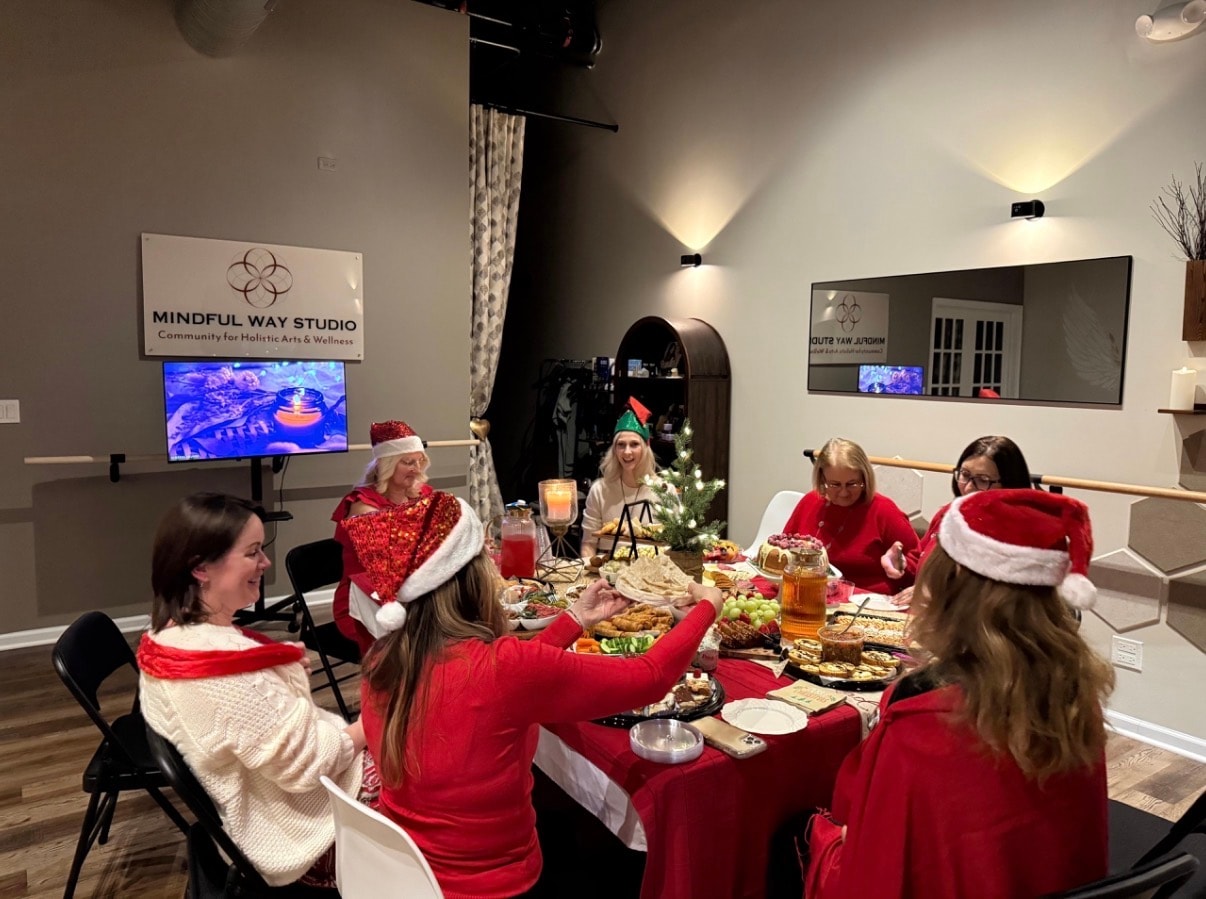 Christmas holiday gathering at Mindful Way Studio with festive table