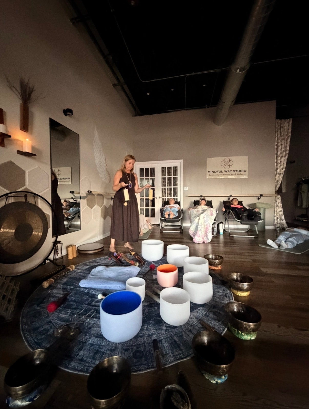 Sound bath in progress with singing bowls and tuning forks