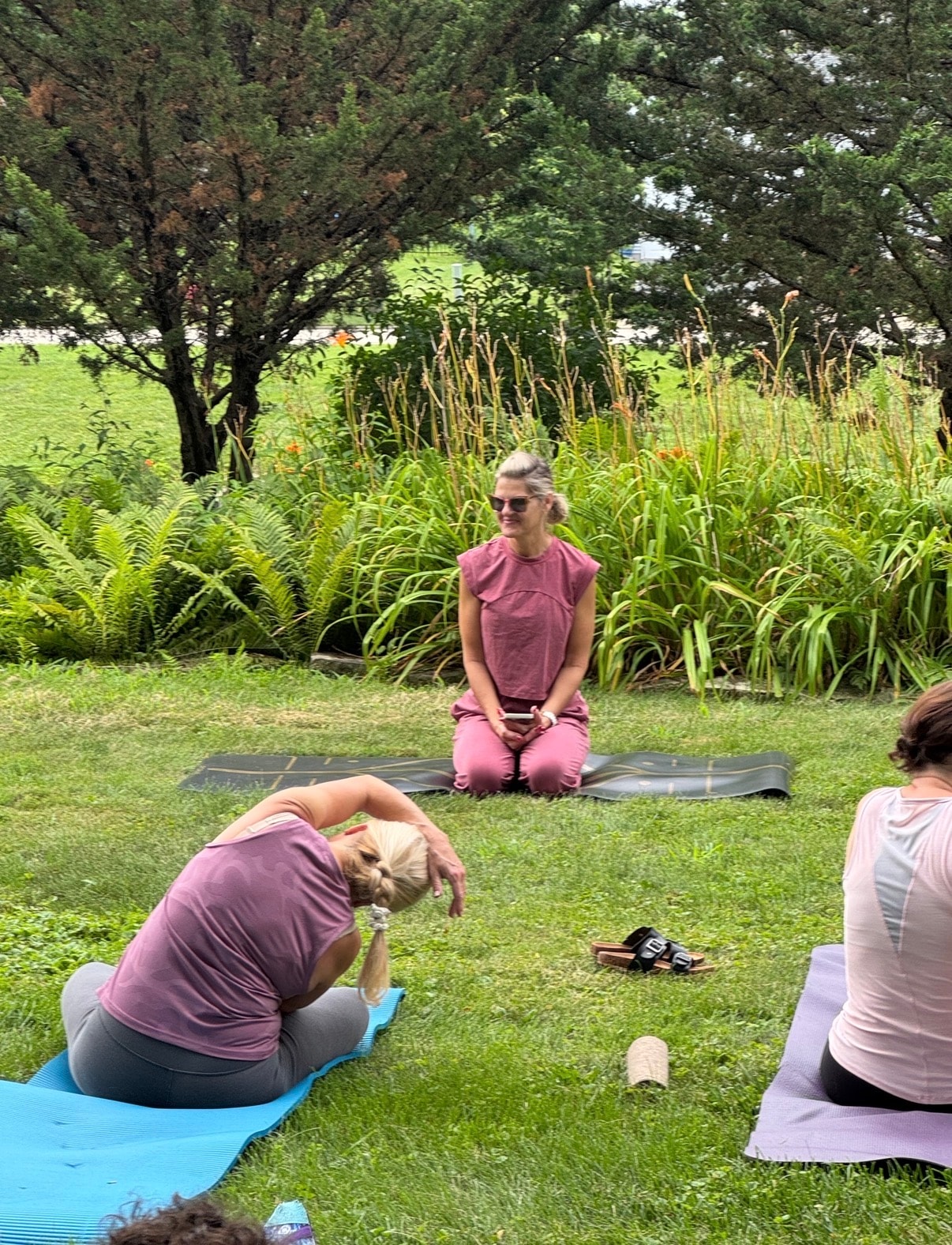 Outdoor yoga class in a garden setting near Mokena IL — Mindful Way Studio community event